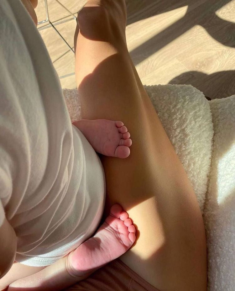 Baby sits on mom's/mum's lap. Monica Yates present, devoted mum blog post